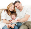 Happy family on their sofa Happy family on their sofa