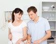 Photo: Lovers cooking together in the kitchen Lovers cooking together in the kitchen