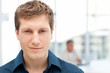 Foto: Happy businessman in his office Happy businessman in his office