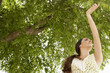 Woman dancing, low angle view.