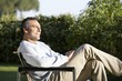 Man Relaxing in Garden