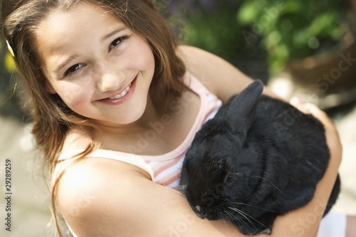 Photo: Girl Holding Rabbit Girl Holding Rabbit