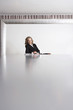Business Executive Sitting in Boardroom