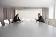Businessmen discussing in boardroom
