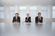 Business Executives Sitting in Conference Room
