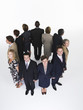 Group of Businesspeople Holding Hands, looking out