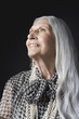 Photo: Senior Woman with Long Hair, looking up Senior Woman with Long Hair, looking up