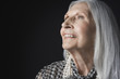 Photo: Senior Woman with Long Hair, looking up Senior Woman with Long Hair, looking up