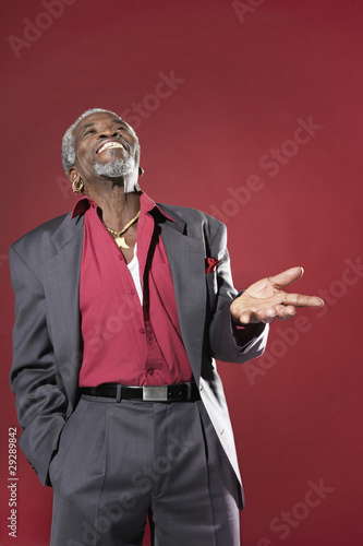 Photo: Man Laughing and Gesturing Man Laughing and Gesturing