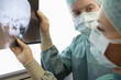 Radiologists Examining X-Ray of skull