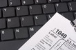 Laptop with a form 1040 Laptop with a form 1040