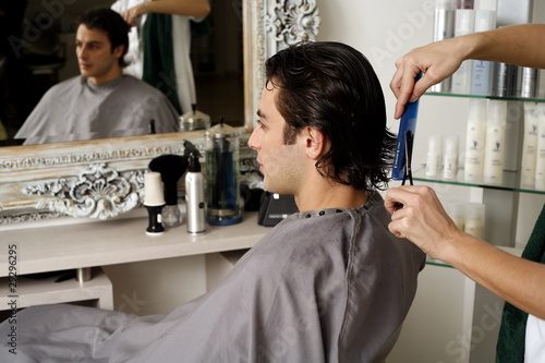 Photo: Young man having a haircut Young man having a haircut