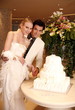 Bride and groom cutting their cake