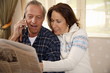Mature couple relaxing at home