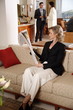 Bussinesswoman working reading newspaper during meeting