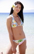 Young woman in bikini on beach