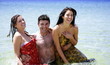Young people playing around in the water
