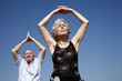 Senior couple stretching