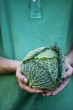 A man holding a cabbage