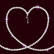 Diamond necklace lying in form of heart Diamond necklace lying in form of heart