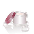 Cream jar and pearl necklace Cream jar and pearl necklace