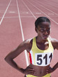 Racer standing on a track