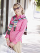 Woman outdoors with shopping bags