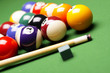 Billiard balls, cue on green table!