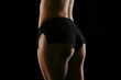 Womans bottom in black knickers