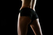 Womans bottom in black knickers
