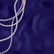 Pink pearls on a blue silk Pink pearls on a blue silk