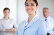 Gorgeous businesswoman in a foreground