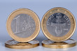 The obverse and reverse of coins of one euro The obverse and reverse of coins of one euro