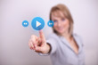 Woman pressing play and media button Woman pressing play and media button