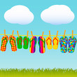 Colorful flip-flops on a rope Colorful flip-flops on a rope