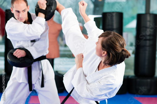 Photo: Martial Arts sport training in gym Martial Arts sport training in gym