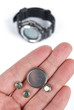 Button battery and wrist watch