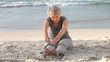Elderly woman doing flexibility exercice