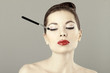Portrait of beautiful woman with a brush for eyeshadow Portrait of beautiful woman with a brush for eyeshadow