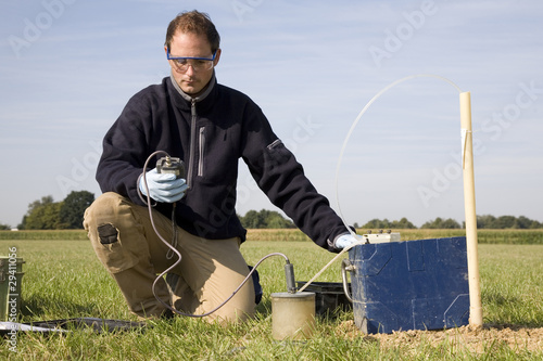 Photo: Taking samples of the soil and groundwater, environmental resear Taking samples of the soil and groundwater, environmental resear