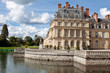 Medieval royal castle Fontainbleau and lake near Paris in France Medieval royal castle Fontainbleau and lake near Paris in France