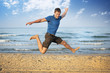 Jumping boy beach