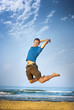Jumping boy sea