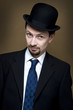 looking from businessman with bowler