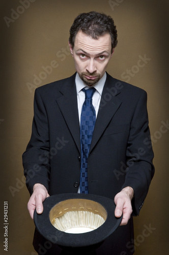 Photo: begging businessman with bowler begging businessman with bowler