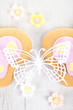ornate paper batterfly and ginger cookies with sugar flowers ornate paper batterfly and ginger cookies with sugar flowers