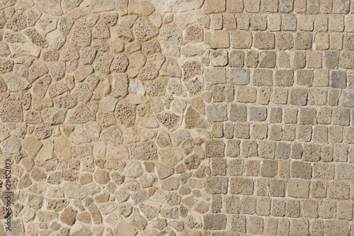 Photo: Two different patterns in wall of limestone and coral blocks Two different patterns in wall of limestone and coral blocks