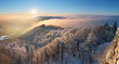 Winter sunset over the clouds - Panoramic view