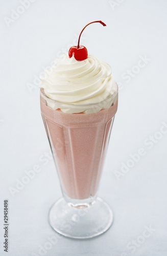 Photo: Milkshake with Whipped Cream and Cherry on Top Milkshake with Whipped Cream and Cherry on Top