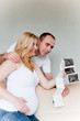 Photo: happy pregnant couple happy pregnant couple